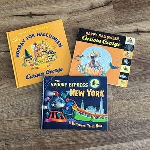 3 hard cover Halloween books including Curious George